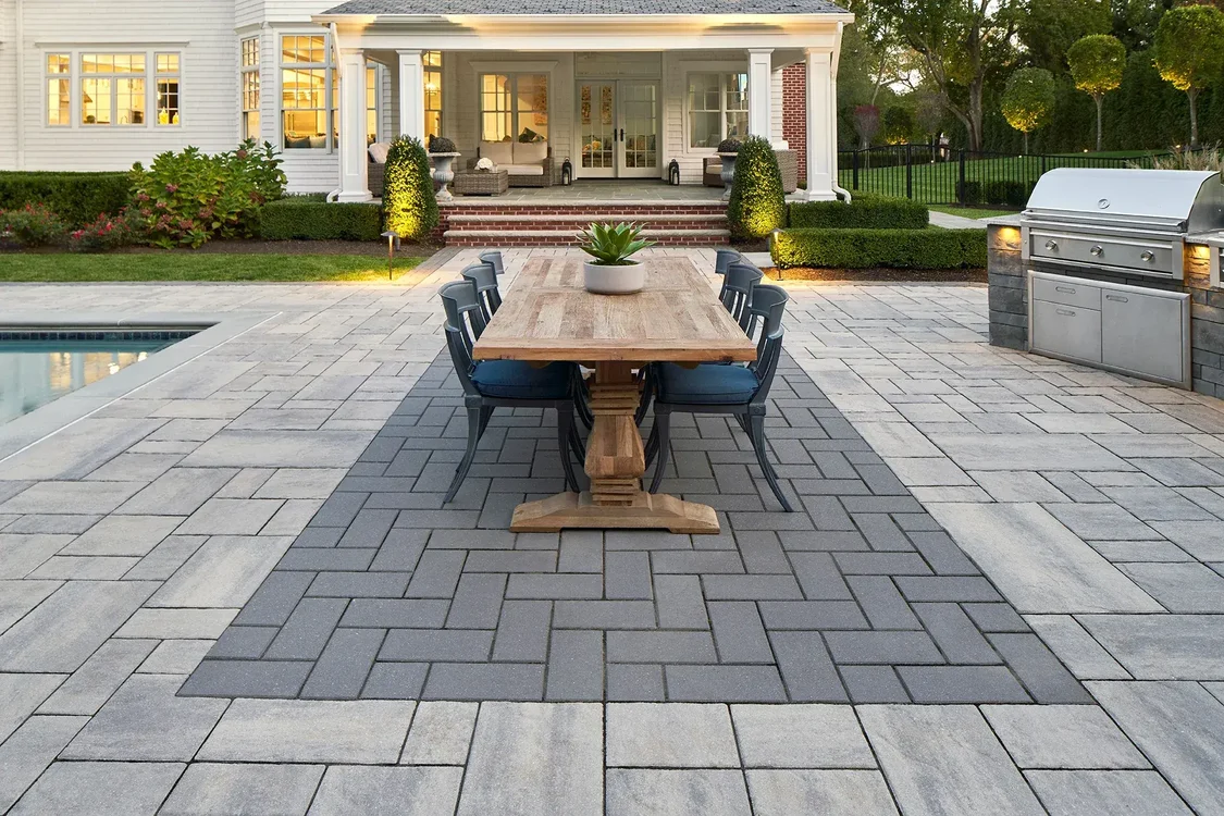 Custom hardscaping and outdoor living space by Bollman Landscape